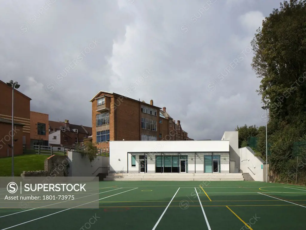 Colston's Girls' School, Bristol, United Kingdom. Architect: Walters and Cohen Ltd, 2011. View of music pavilion with bordering sports field.