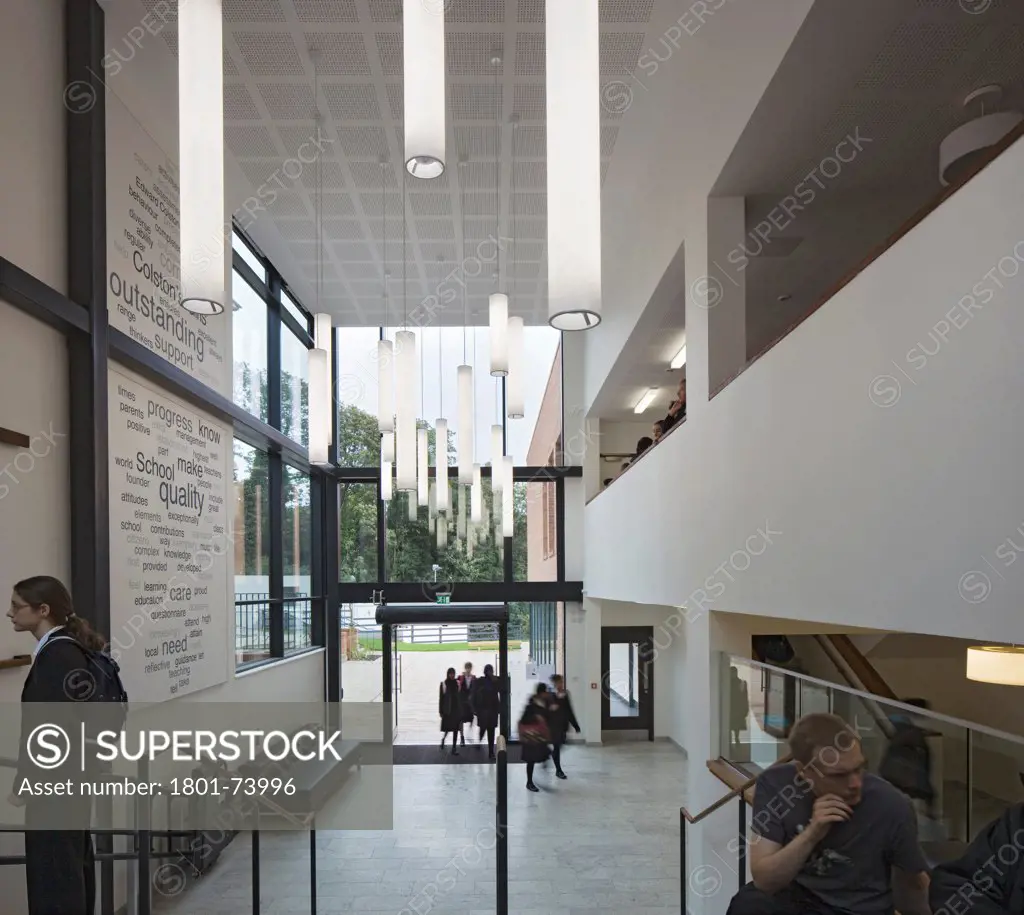Colston's Girls' School, Bristol, United Kingdom. Architect: Walters and Cohen Ltd, 2011. View of entrance foyer with mezzanine and glazed schoolyard access.