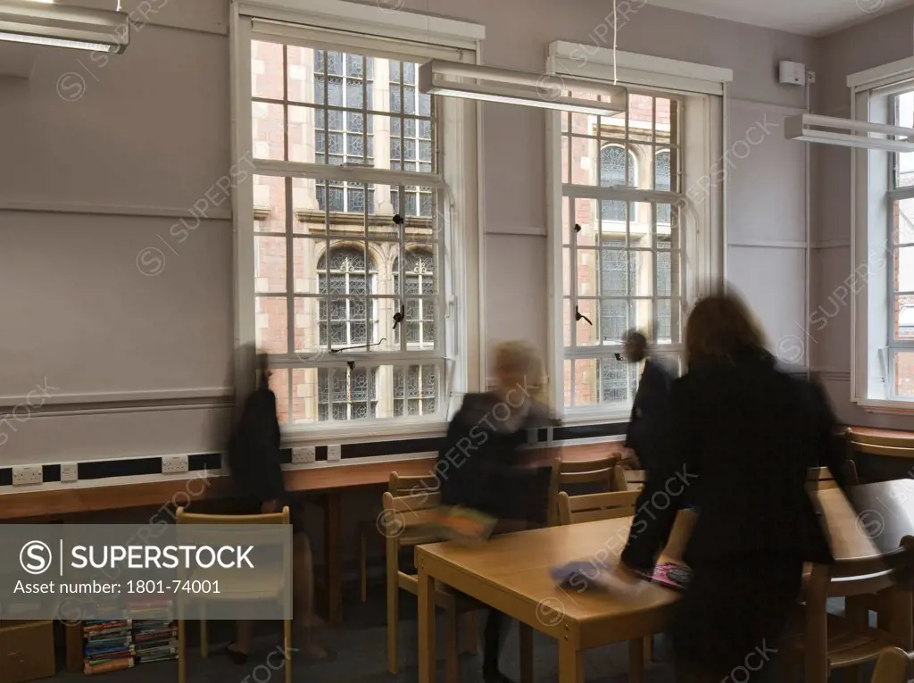 Colston's Girls' School, Bristol, United Kingdom. Architect: Walters and Cohen Ltd, 2011. Library interior with multi-pane windows.