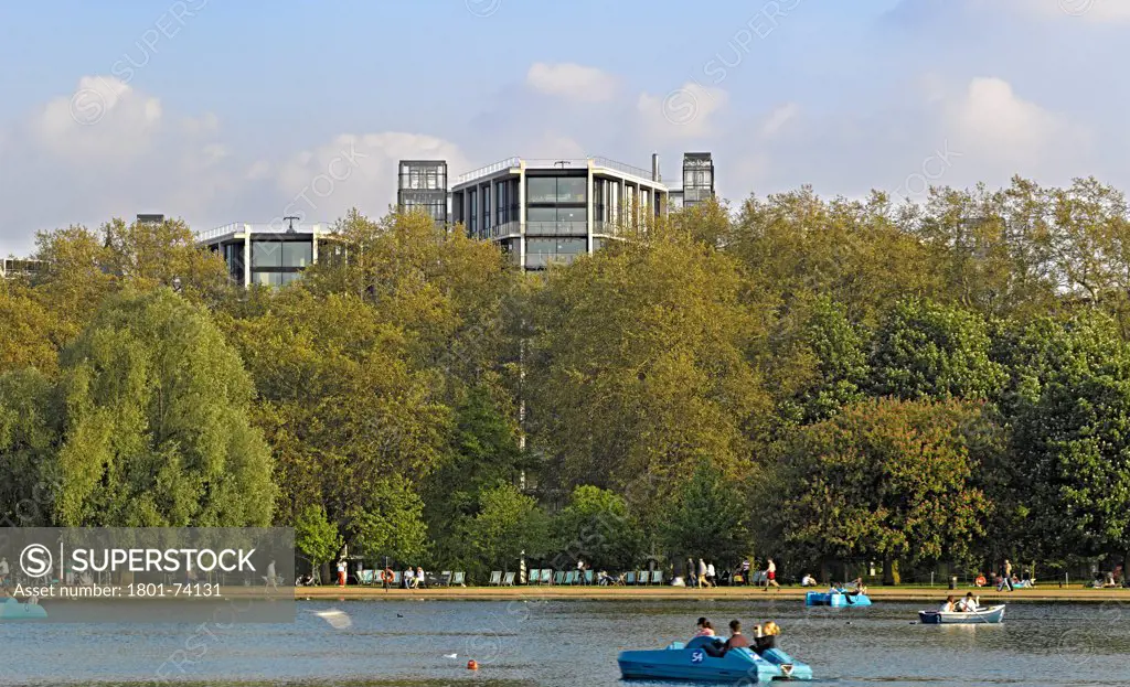 One Hyde Park, London, United Kingdom. Architect: Rogers Stirk Harbour + Partners, 2011. Overall exterior view from Serpentine lake.