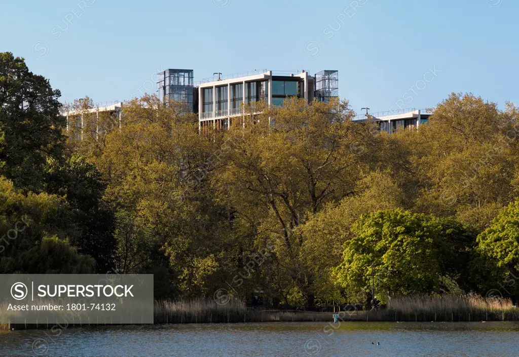 One Hyde Park, London, United Kingdom. Architect: Rogers Stirk Harbour + Partners, 2011. Overall exterior view from Serpentine lake.