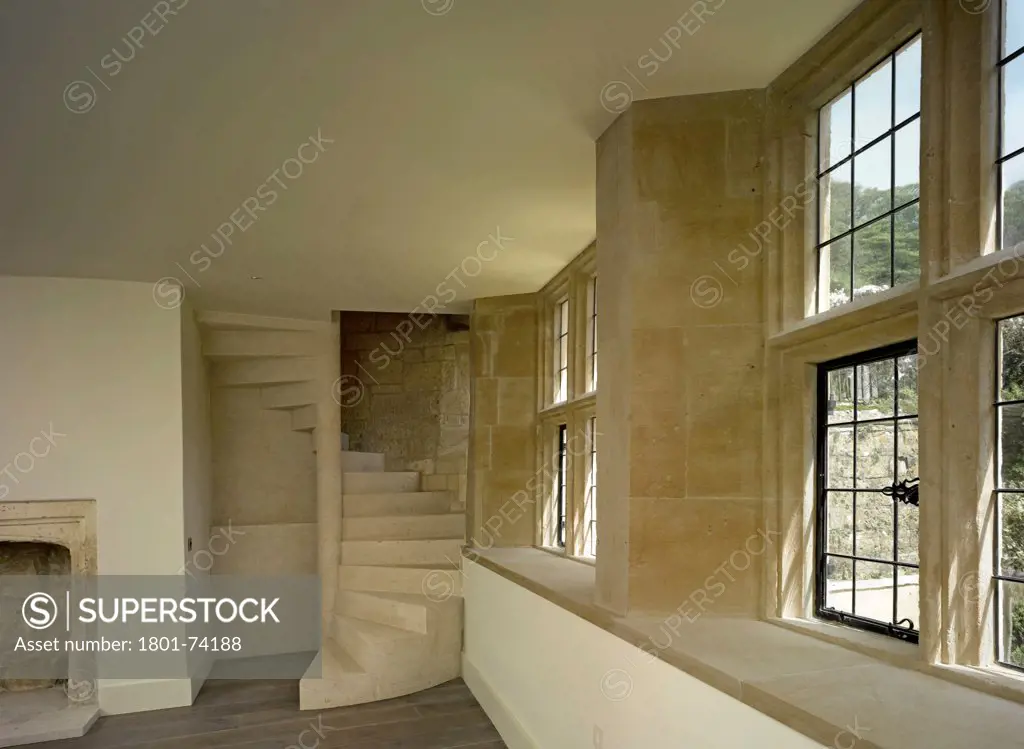 Home Farm, Dowdeswell, United Kingdom. Architect: De Matos Ryan, 2012. Windows and staircase in dinning room.