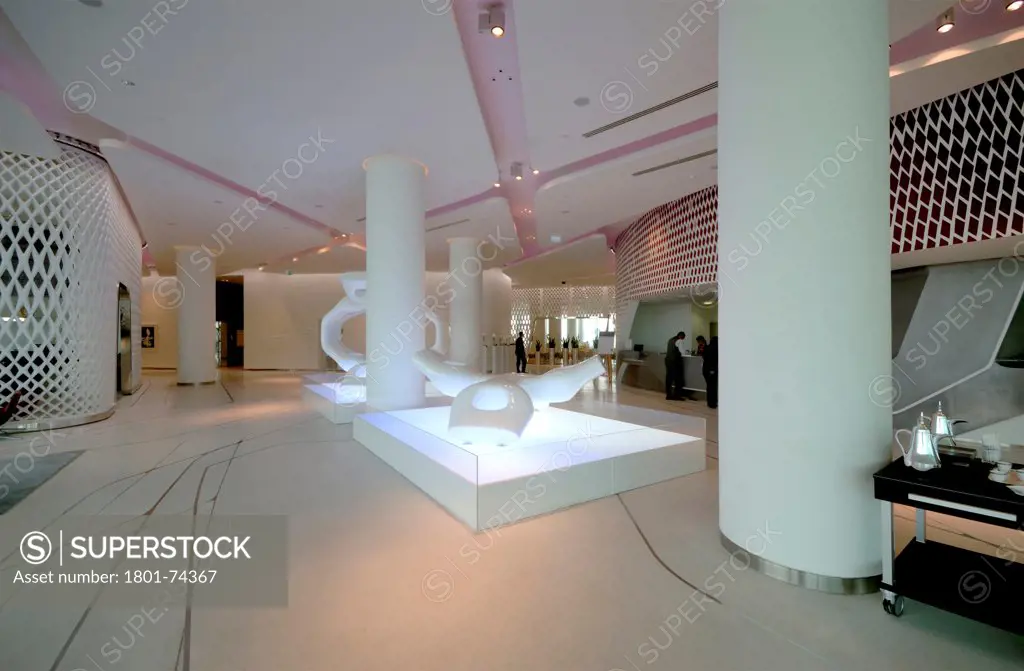 Yas Hotel, Abu Dhabi, United Arab Emirates. Architect: Asymptote, Hani Rashid, Lise Anne Couture, 2010. Lobby with Asymptote sculptures.