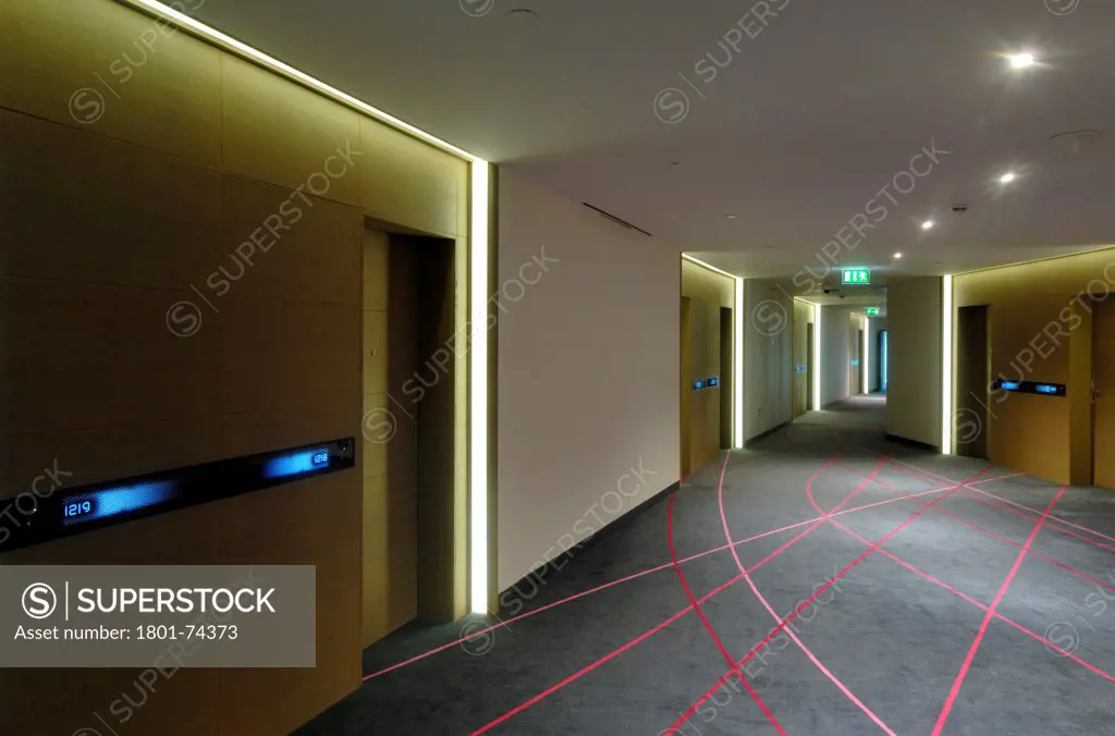 Yas Hotel, Abu Dhabi, United Arab Emirates. Architect: Asymptote, Hani Rashid, Lise Anne Couture, 2010. Corridor of rooms floor.