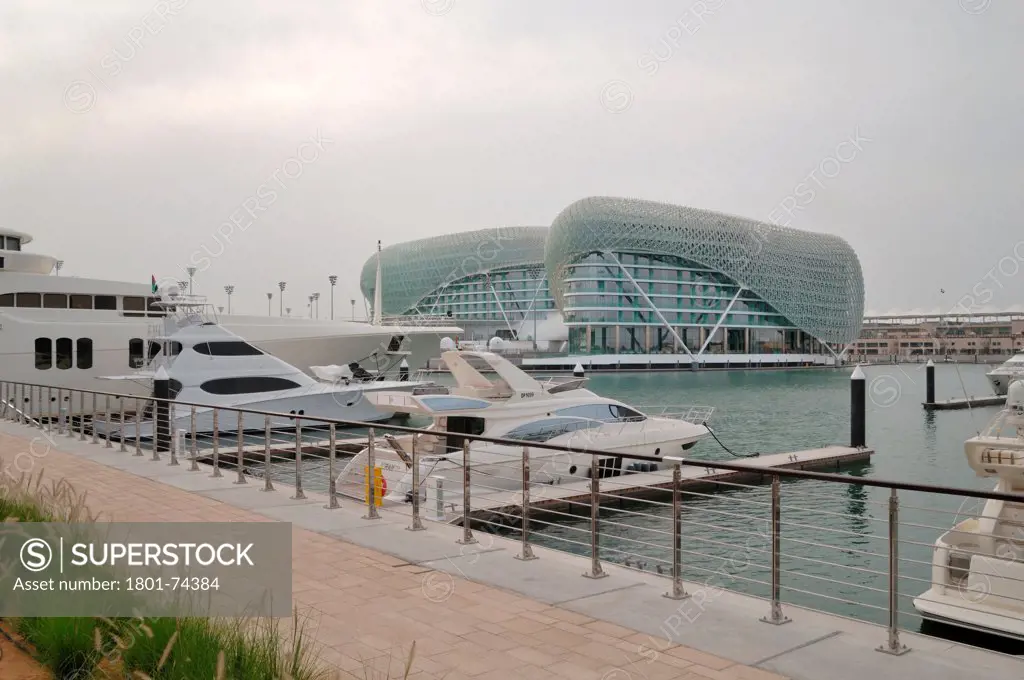 Yas Hotel, Abu Dhabi, United Arab Emirates. Architect: Asymptote, Hani Rashid, Lise Anne Couture, 2010. View from marina.
