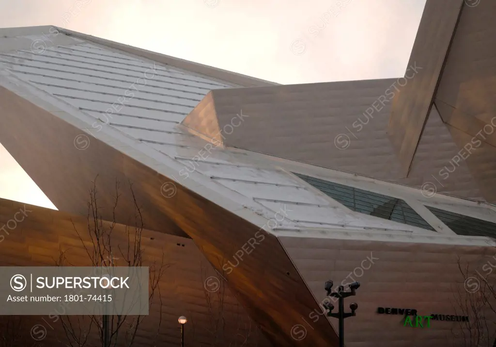 Extension to the Denver Art Museum, Frederic C. Hamilton Building, Denver, United States. Architect: Daniel Libeskind, 2006. Detail of exterior at sunset.