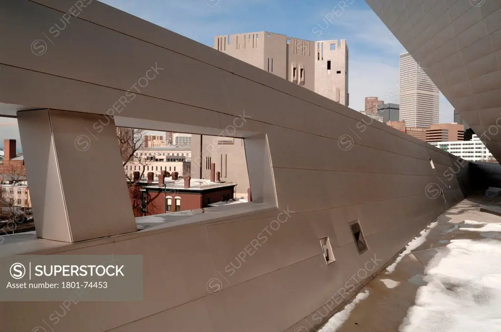 Extension to the Denver Art Museum, Frederic C. Hamilton Building, Denver, United States. Architect: Daniel Libeskind, 2006. View of terrace, old museum by Giò Ponti on the background.
