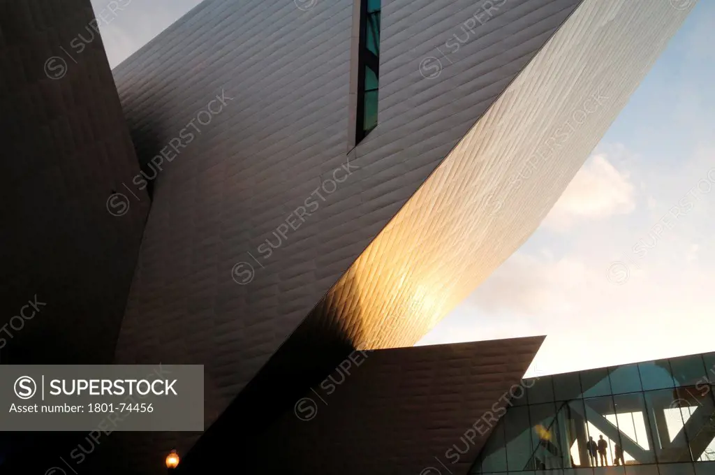Extension to the Denver Art Museum, Frederic C. Hamilton Building, Denver, United States. Architect: Daniel Libeskind, 2006. Detail of the ""tail"" with bridge linking to the old museum.
