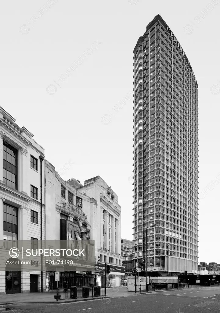 Centre Point, London, United Kingdom. Architect: Richard Seifert, 1967. Centre Point and Dominion Theatre from Tottenham Court Road.