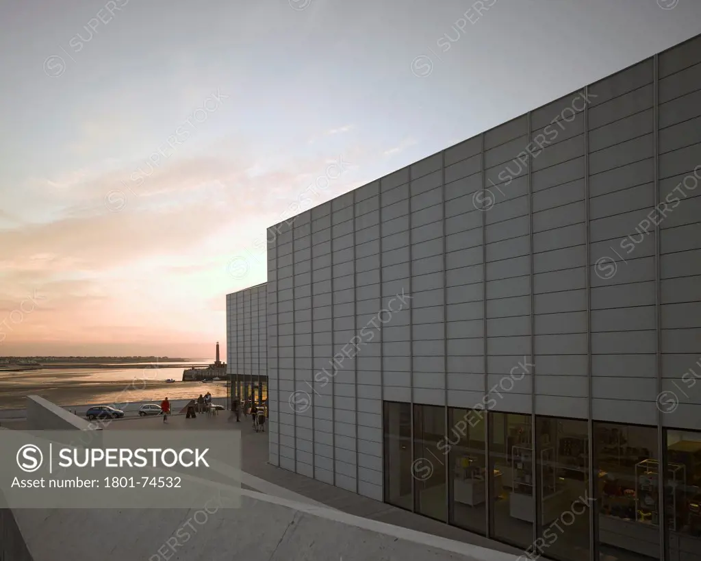 Turner Contemporary Gallery, Margate, United Kingdom. Architect: David Chipperfield Architects Ltd, 2011. Looking west with sunset.