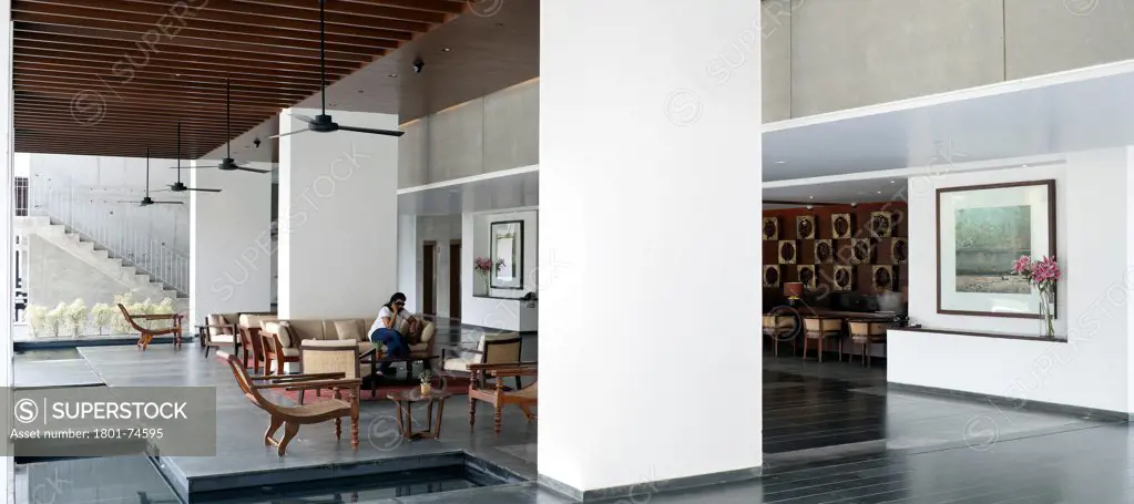 Alila Bangalore Hotel and Apartments, Bangalore, India. Architect: Allies and Morrison, Hundred Hands, 2012. Panorama of the lobby and lounge area.