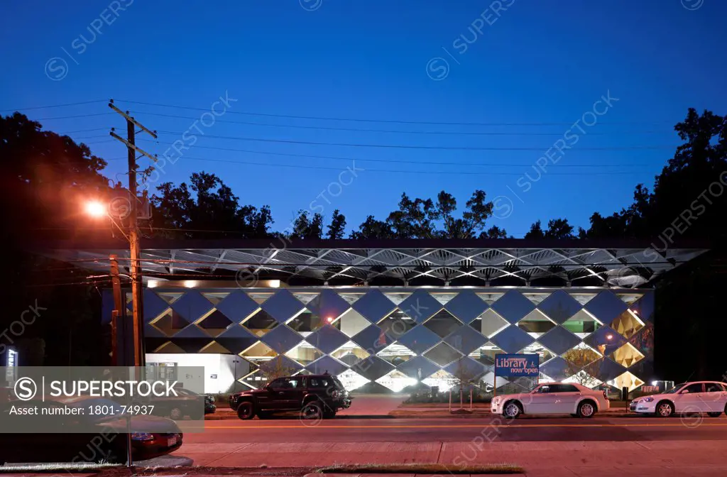 The Francis Gregory Library, Washington, United States. Architect: Adjaye Associates, 2012. Overall exterior view at dusk.