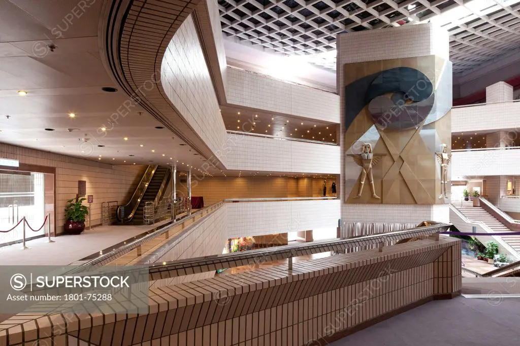 Hong Kong Cultural Centre, Kowloon, Hong Kong. Architect: Pau Shiu-hung, 1989. First floor balcony leading to the stairs with bas relief mural on the column.