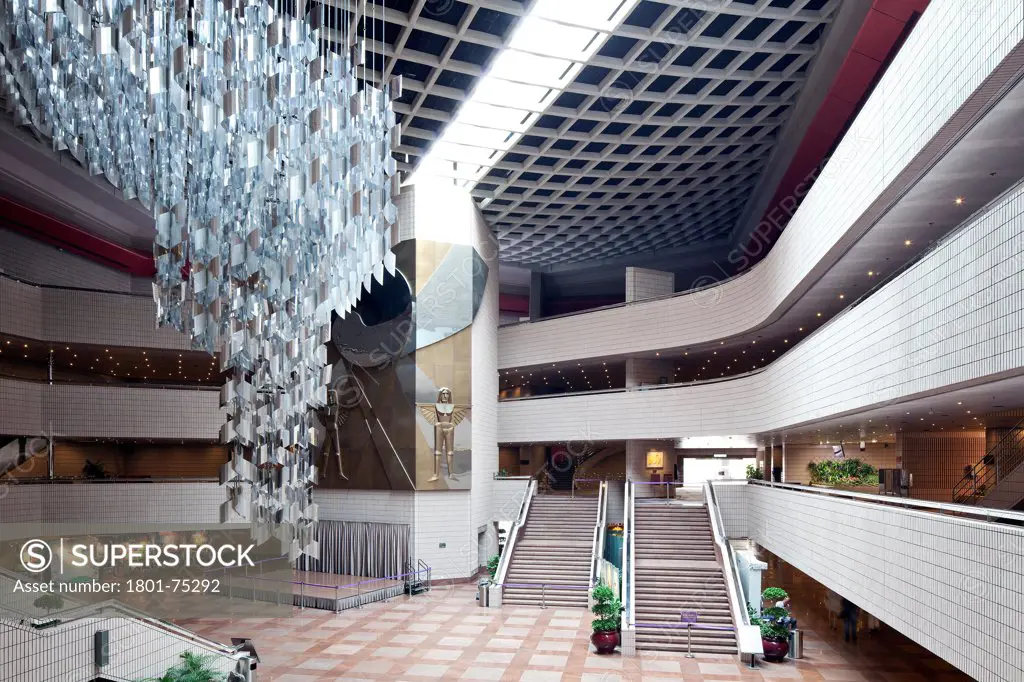 Hong Kong Cultural Centre, Kowloon, Hong Kong. Architect: Pau Shiu-hung, 1989. View of the lobby with large chandelier.
