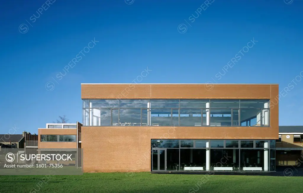 Sandford Park School, Ranelagh, Ireland. Architect: DTA Architects, 2007. View of new addition showing brick facade, and surroundings.