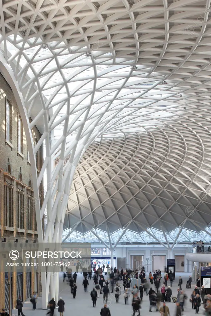 King's Cross Station, Railway Station, Europe, United Kingdom, , 2012, John McAslan & Partners. Portait view towards funnel in Western Concourse.