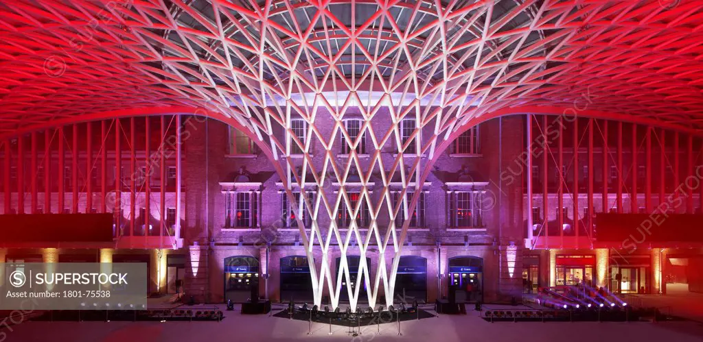 King's Cross Station, Railway Station, Europe, United Kingdom, , 2012, John McAslan & Partners. View of Western Concourse showing new roof with red lighting.