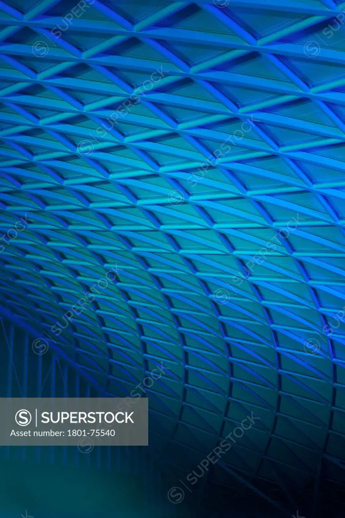 King's Cross Station, Railway Station, Europe, United Kingdom, , 2012, John McAslan & Partners. View of Western Concourse roof with blue lighting.