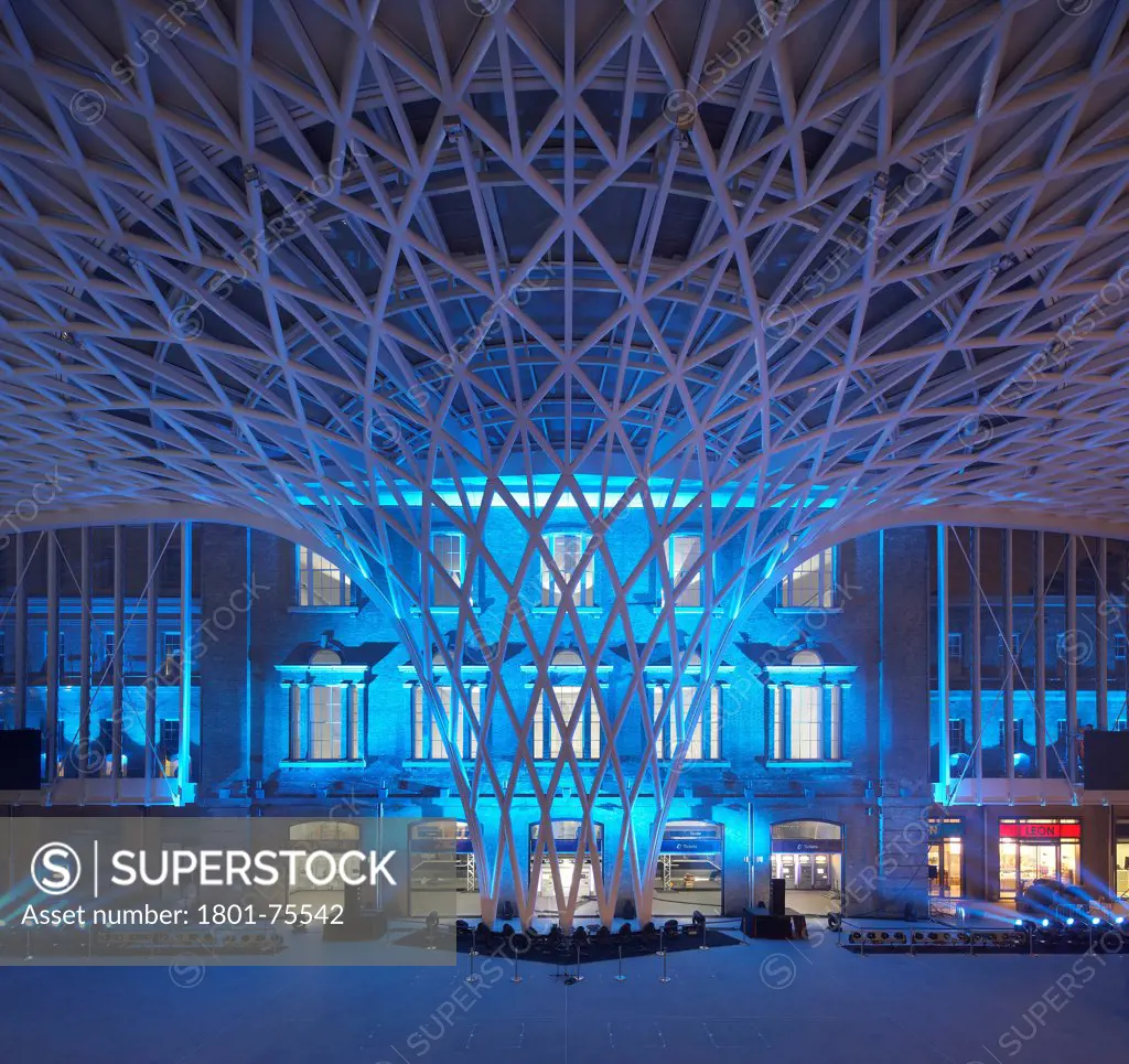 King's Cross Station, Railway Station, Europe, United Kingdom, , 2012, John McAslan & Partners. View of Western Concourse showing new roof with blue lighting.