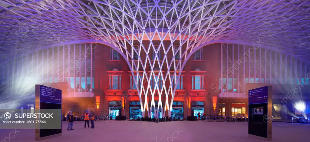King's Cross Station, Railway Station, Europe, United Kingdom, , 2012, John McAslan & Partners. View of Western Concourse roof with blue, red, purple lighting.