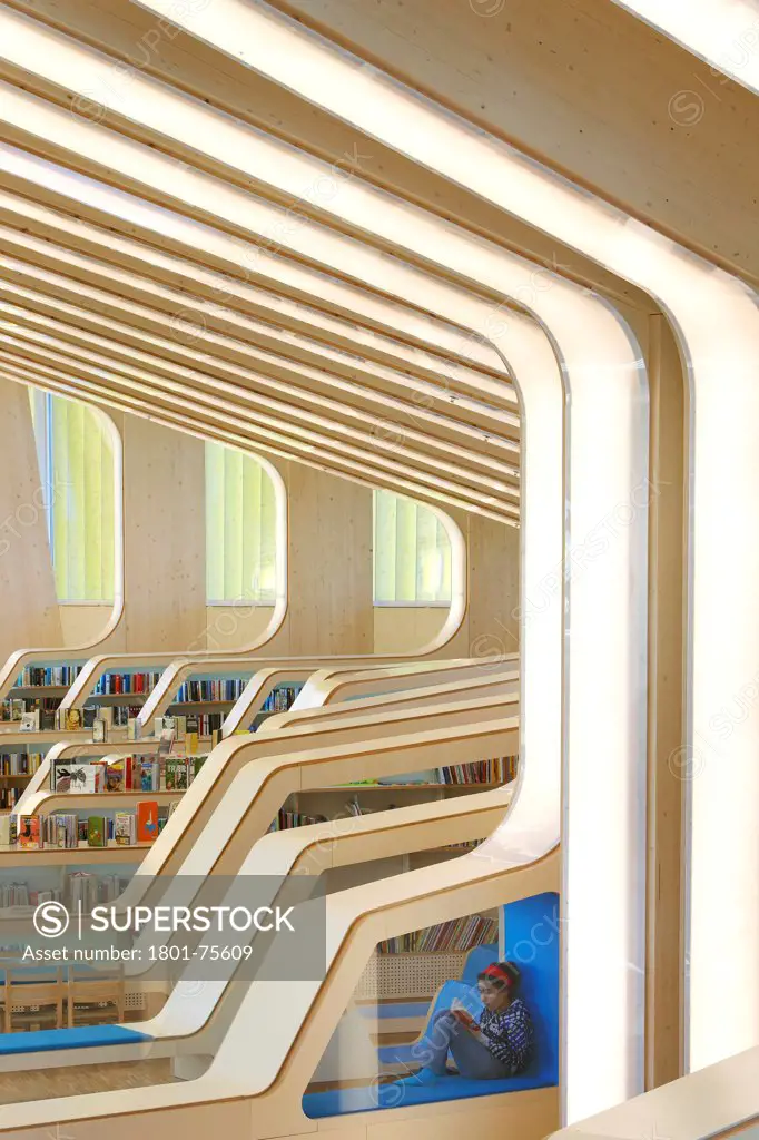 Vennesla Library, Library, Europe, Norway, , 2012, Helen & Hard. Detail of interior with person reading.
