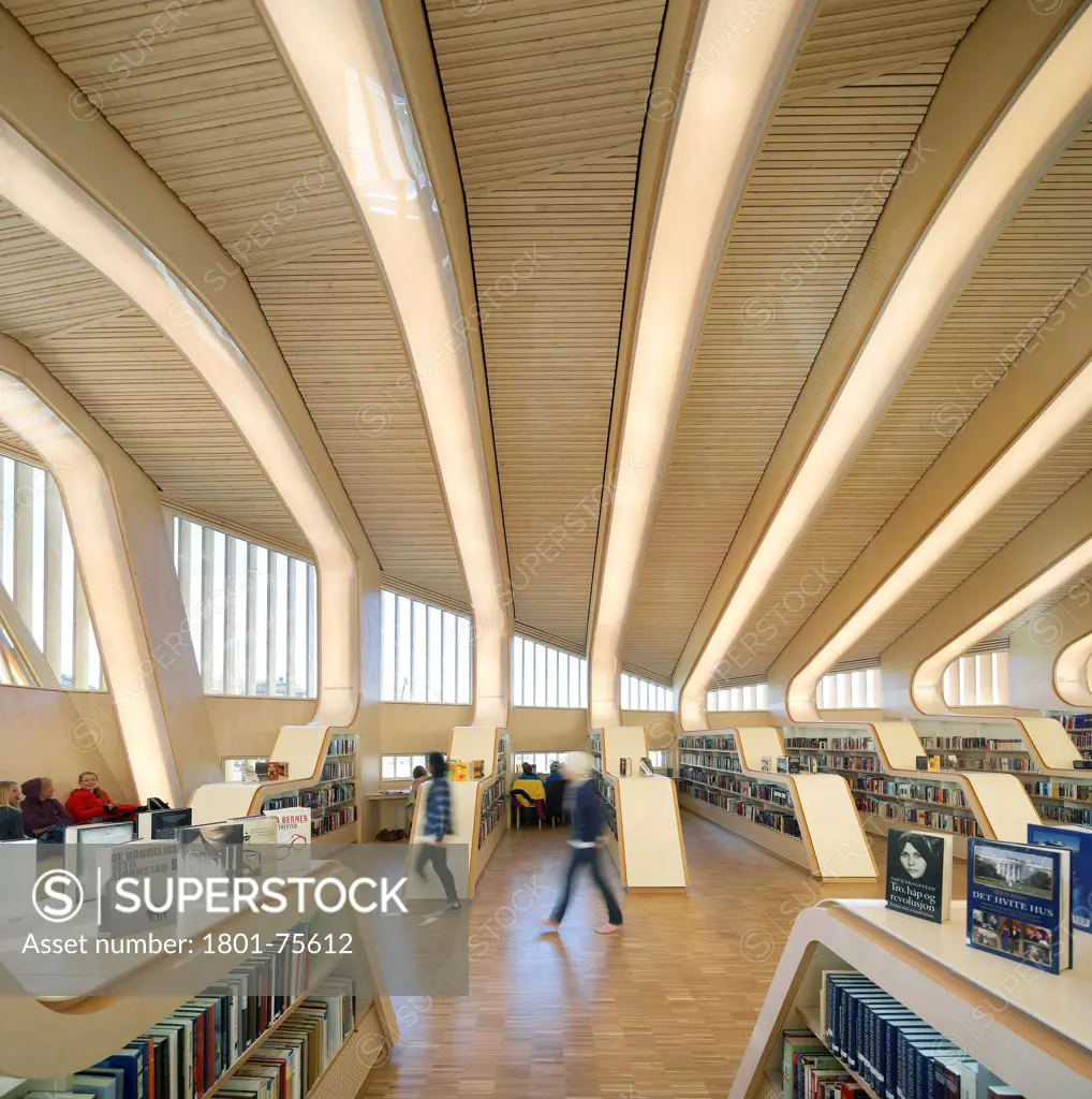Vennesla Library, Library, Europe, Norway, , 2012, Helen & Hard. Wide view amongst shelving with people.