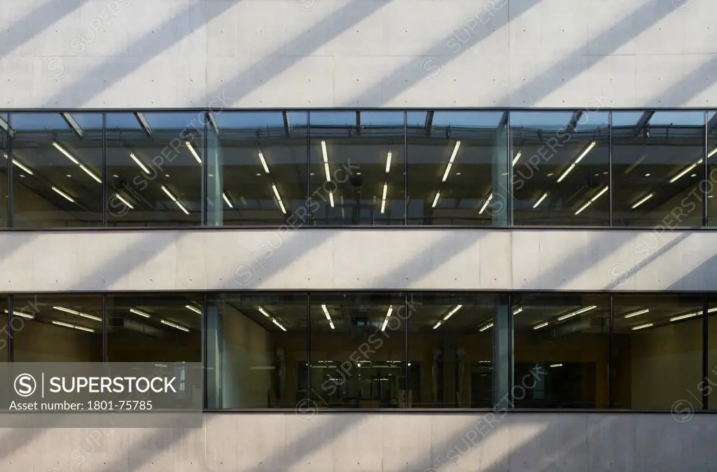 Central Saint Martins, London, United Kingdom. Architect: Stanton Williams, 2011. Atrium looking into rooms.