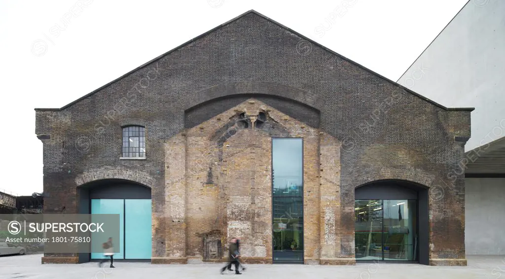 Central Saint Martins, London, United Kingdom. Architect: Stanton Williams, 2011. Exterior of brick listed building.