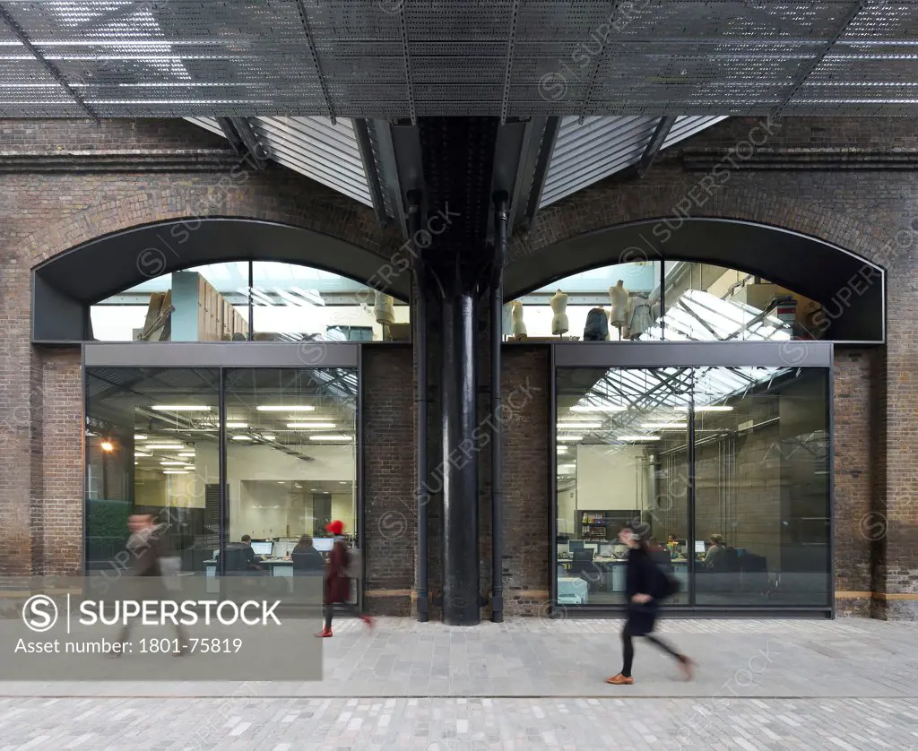 Central Saint Martins, London, United Kingdom. Architect: Stanton Williams, 2011. Exterior with pedestrians.