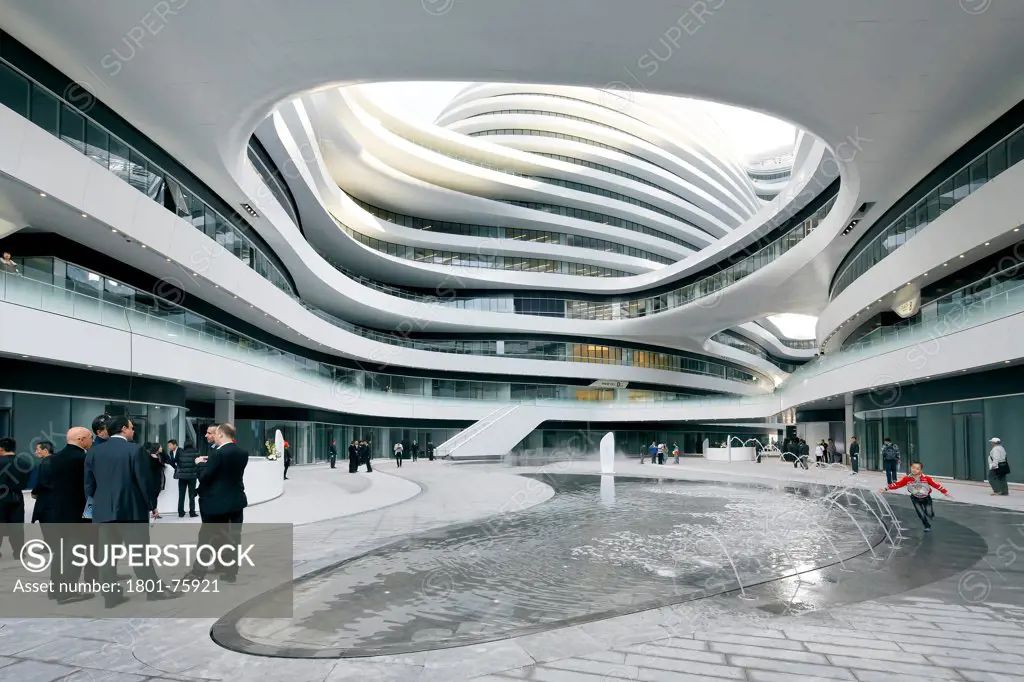 Galaxy Soho, Beijing, China. Architect: Zaha Hadid Architects, 2012. Inner courtyard view with water features.