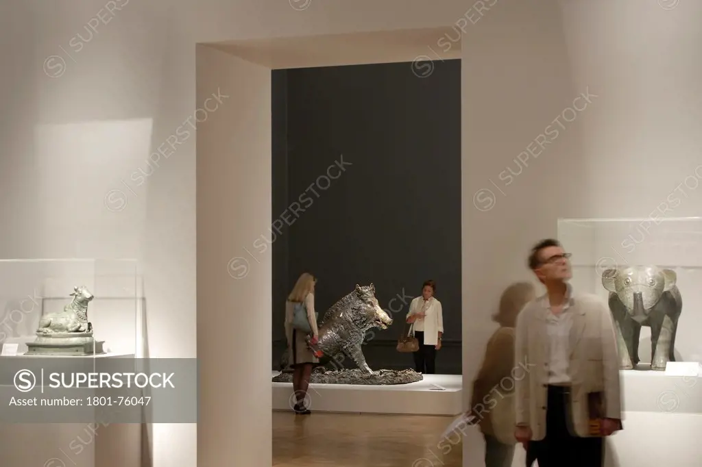 Royal Academy Bronze Exhibition, London, United Kingdom. Architect: Stanton Williams, 2012. View through exhibition rooms with animal sculptures.