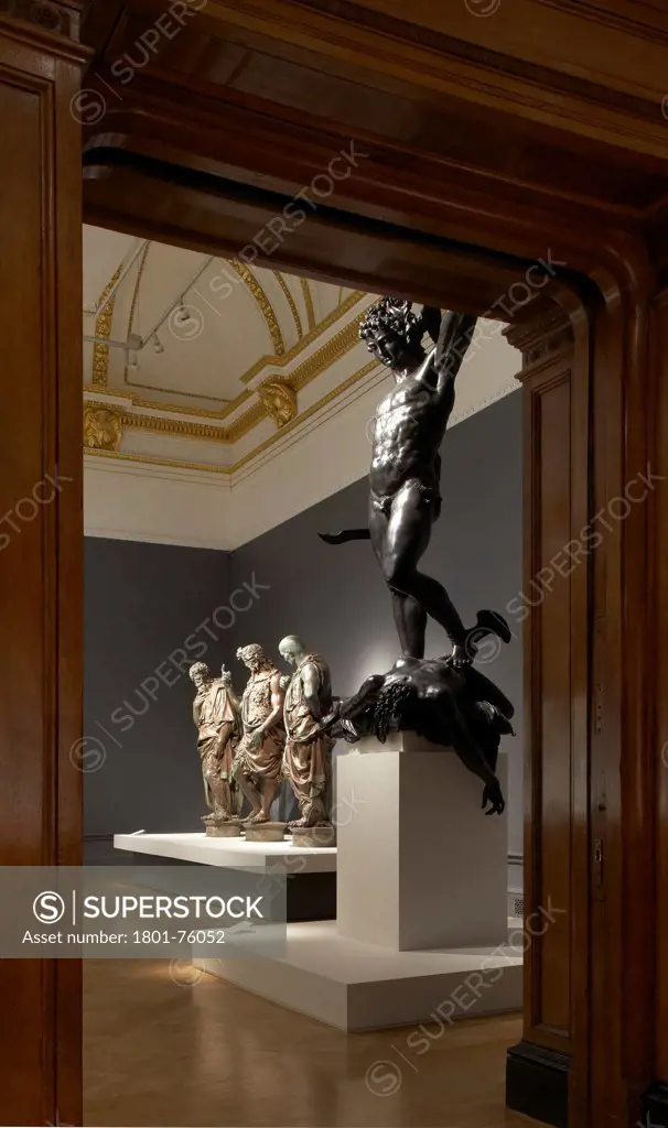 Royal Academy Bronze Exhibition, London, United Kingdom. Architect: Stanton Williams, 2012. View through to Italian Renaissance sculptures.