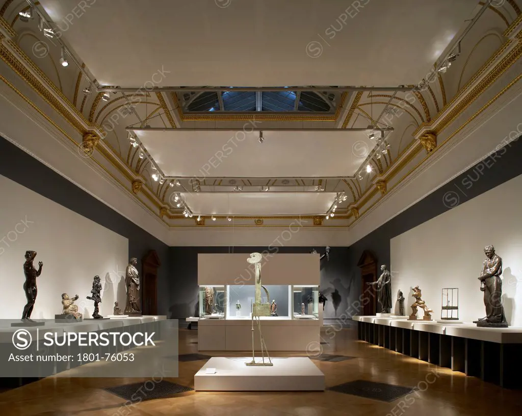 Royal Academy Bronze Exhibition, London, United Kingdom. Architect: Stanton Williams, 2012. View into exhibition room with roof light and suspended light shading.