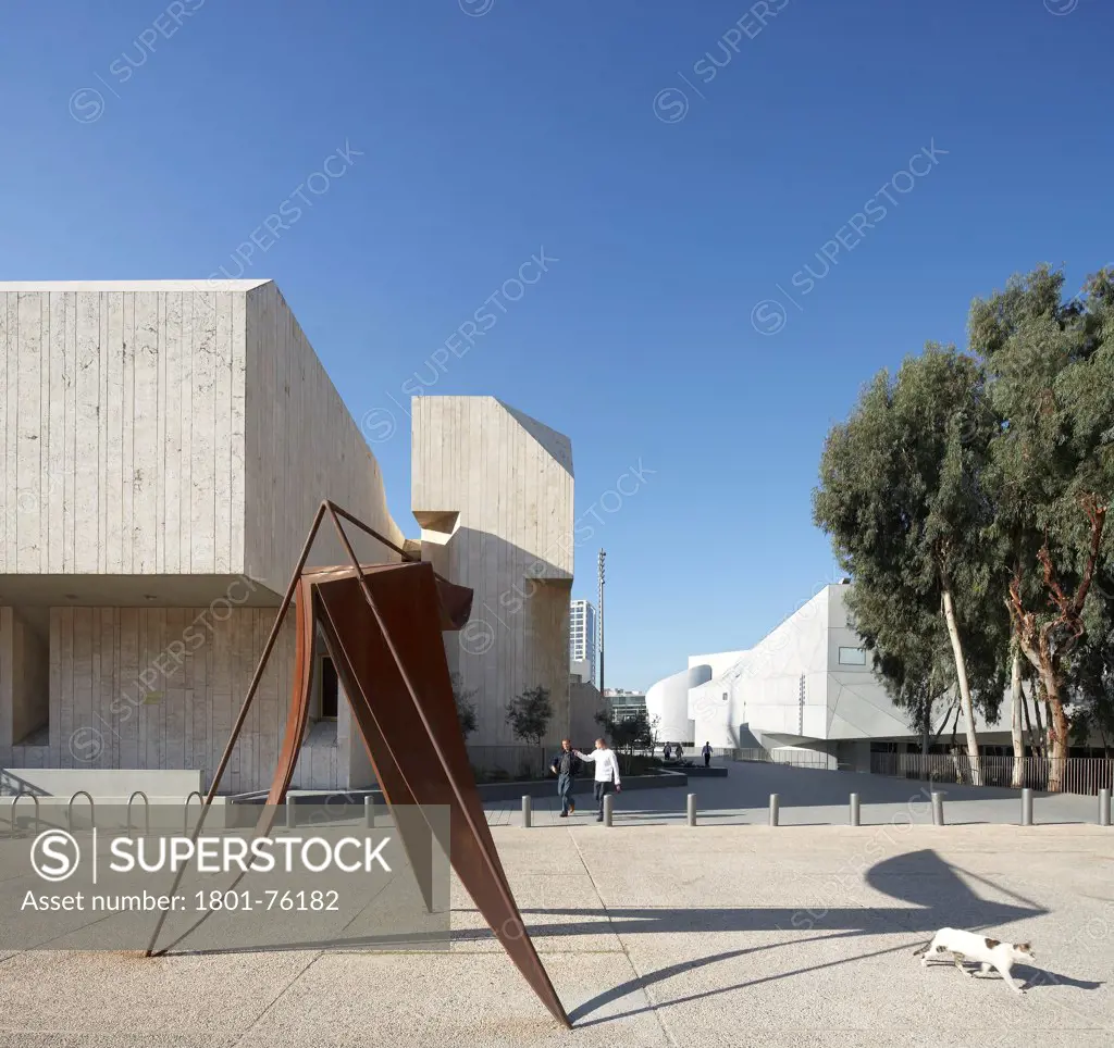 Tel Aviv Museum of Art, Tel Aviv, Israel. Architect: Preston Scott Cohen, 2011. Exterior elevation of cultural complex with abstract metal sculpture.