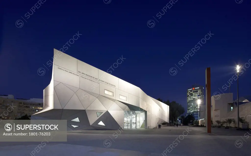 Tel Aviv Museum of Art, Tel Aviv, Israel. Architect: Preston Scott Cohen, 2011. Exterior elevation at night.