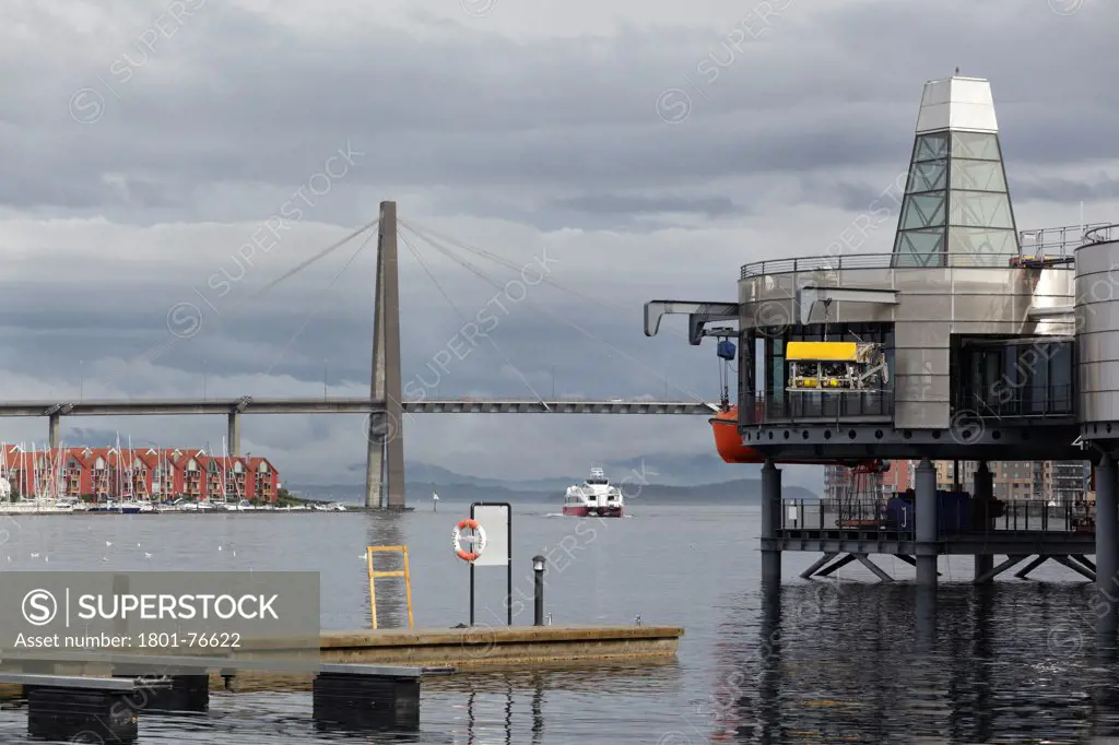 Exterior showing cylindrical platform with Stavanger City Bridge and ferry in background, Norwegian Petroleum Museum (Norsk Oljemuseum), Stavanger, Norway&#xA;Architects: Lunde & Løvseth Arkitekter (1999)