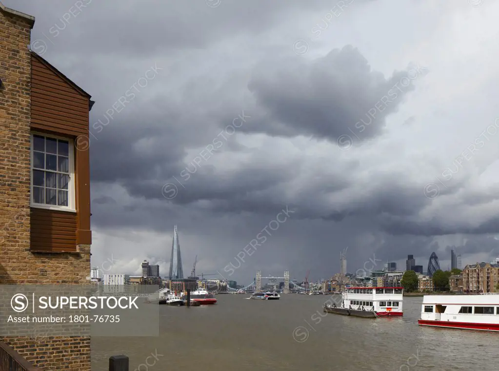 The SHARD, London, United Kingdom. Architect: Renzo Piano Building Workshop, 2012. Grand view from Rotherhithe river bank with Tower Bridge.
