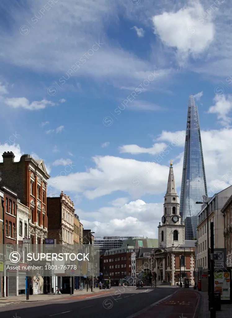 The SHARD, London, United Kingdom. Architect: Renzo Piano Building Workshop, 2012. West elevation with street scene in morning light.