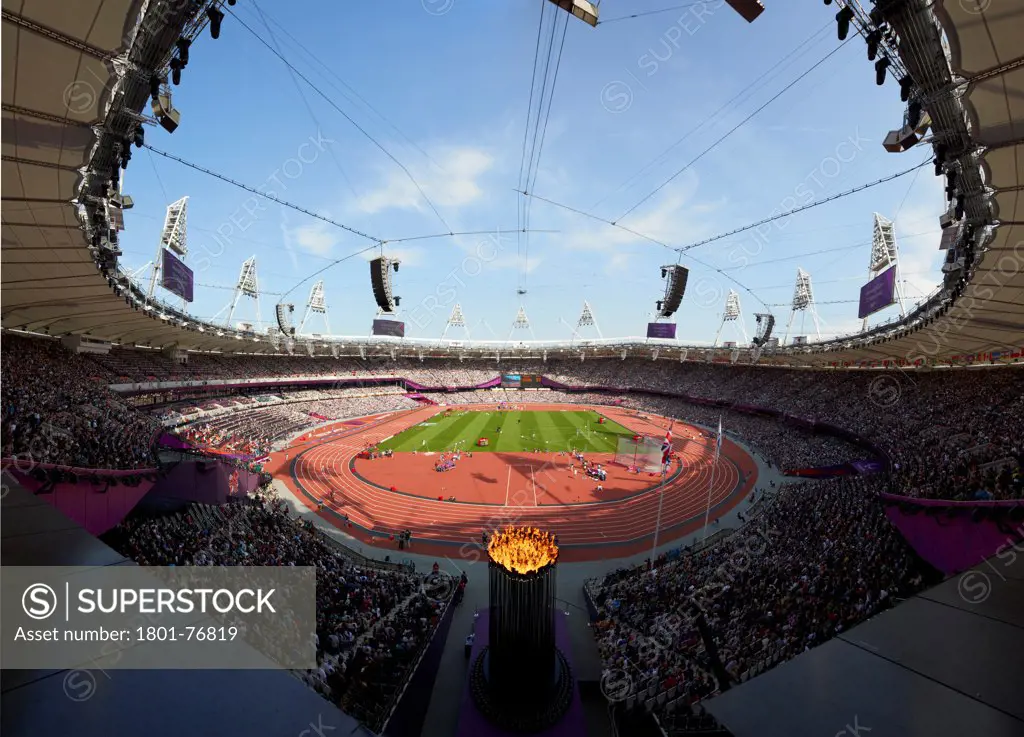 Olympic Cauldron, Art Installation, Europe, United Kingdom, , 2012, Heatherwick Studio. Overall view from upper level with full stadium, distorted stitched image.