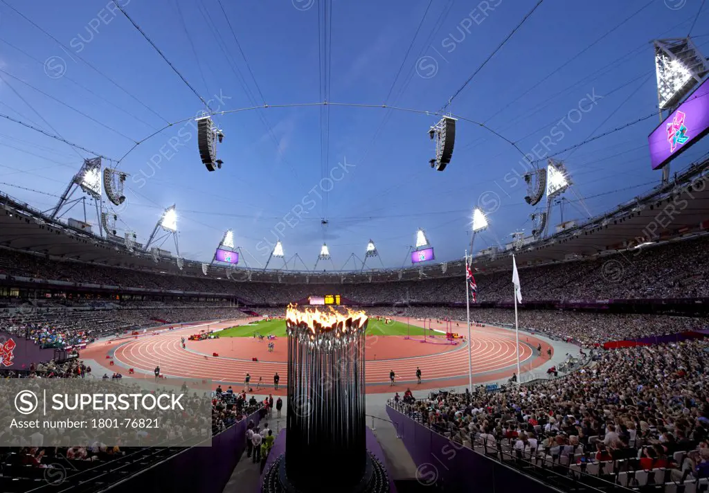 Olympic Cauldron, Art Installation, Europe, United Kingdom, , 2012, Heatherwick Studio. Overall view from mid level with full stadium at dusk.