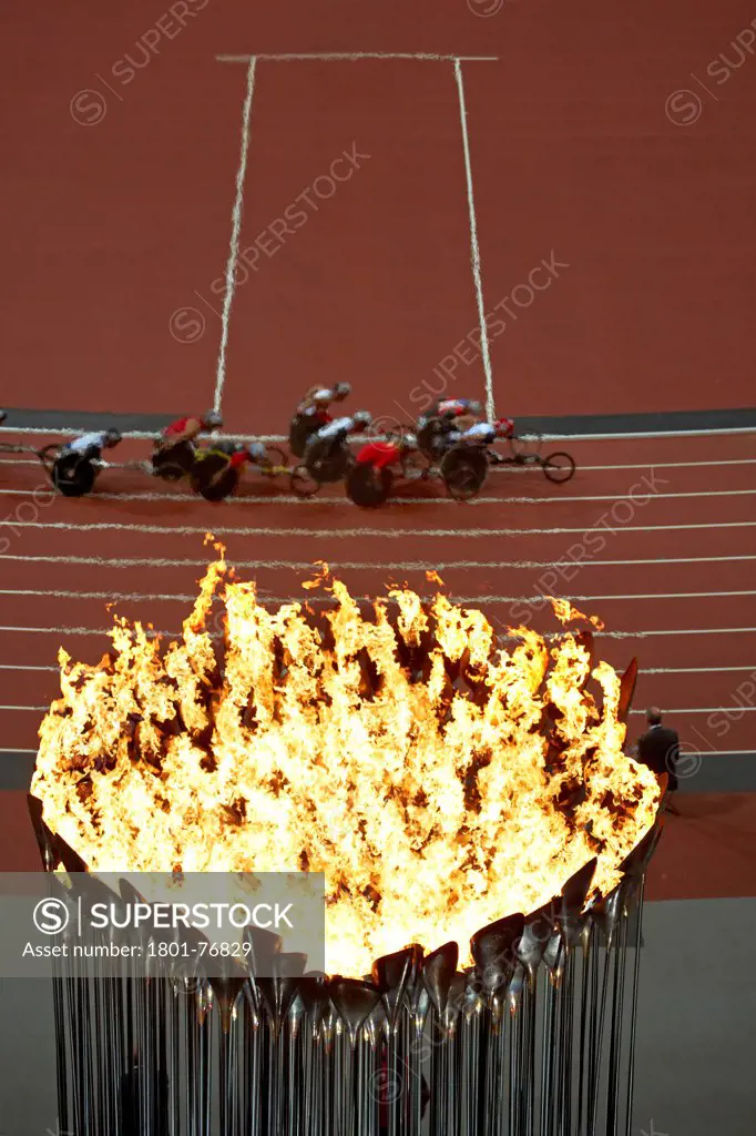 Olympic Cauldron, Art Installation, Europe, United Kingdom, , 2012, Heatherwick Studio. Abstract view from above showing cauldron with Paralympic athletes.