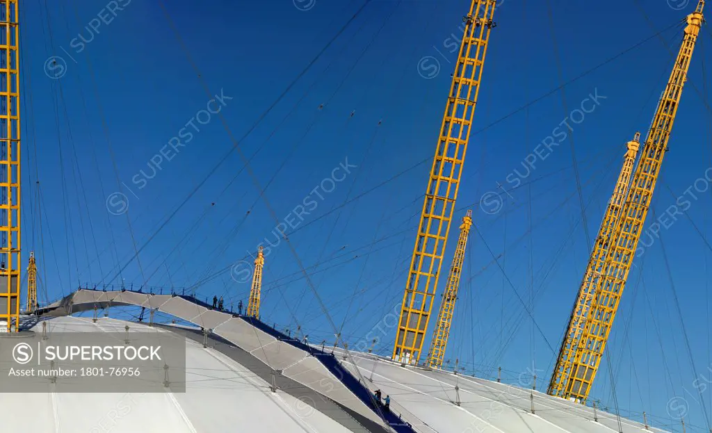 'Up at the O2'- High level walkway over the Millenium Dome, London, United Kingdom. Architect: Rogers Stirk Harbour + Partners, 2012. Day time view with Figures.