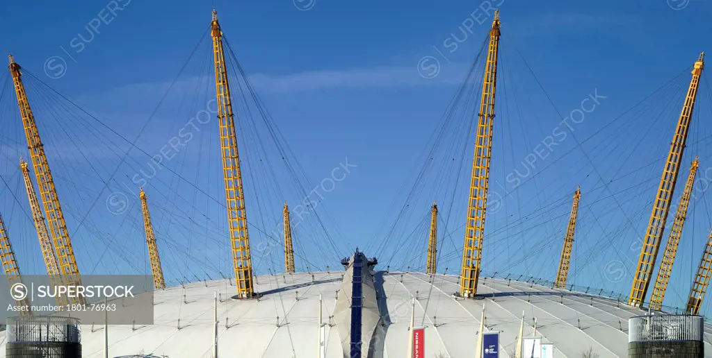 'Up at the O2'- High level walkway over the Millenium Dome, London, United Kingdom. Architect: Rogers Stirk Harbour + Partners, 2012. Detail view of dome with walkway.