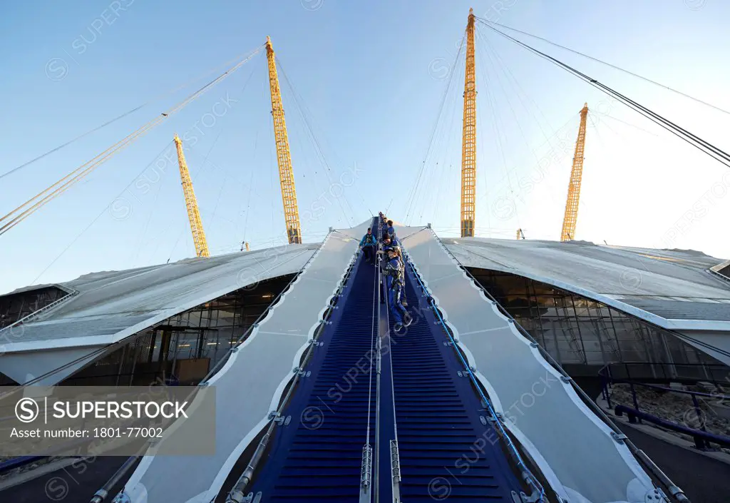 'Up at the O2'- High level walkway over the Millenium Dome, London, United Kingdom. Architect: Rogers Stirk Harbour + Partners, 2012. View from bottom of walkway.