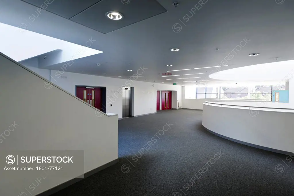 Strood Academy, Academy School, Europe, United Kingdom, Kent, 2012, Nicholas Hare Architects LLP. Interior showing semi-circular void circulation space and stairway.