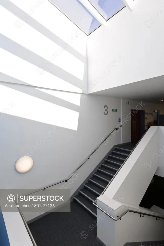 Strood Academy, Academy School, Europe, United Kingdom, Kent, 2012, Nicholas Hare Architects LLP. Interior showing staircase, roof light and number three.