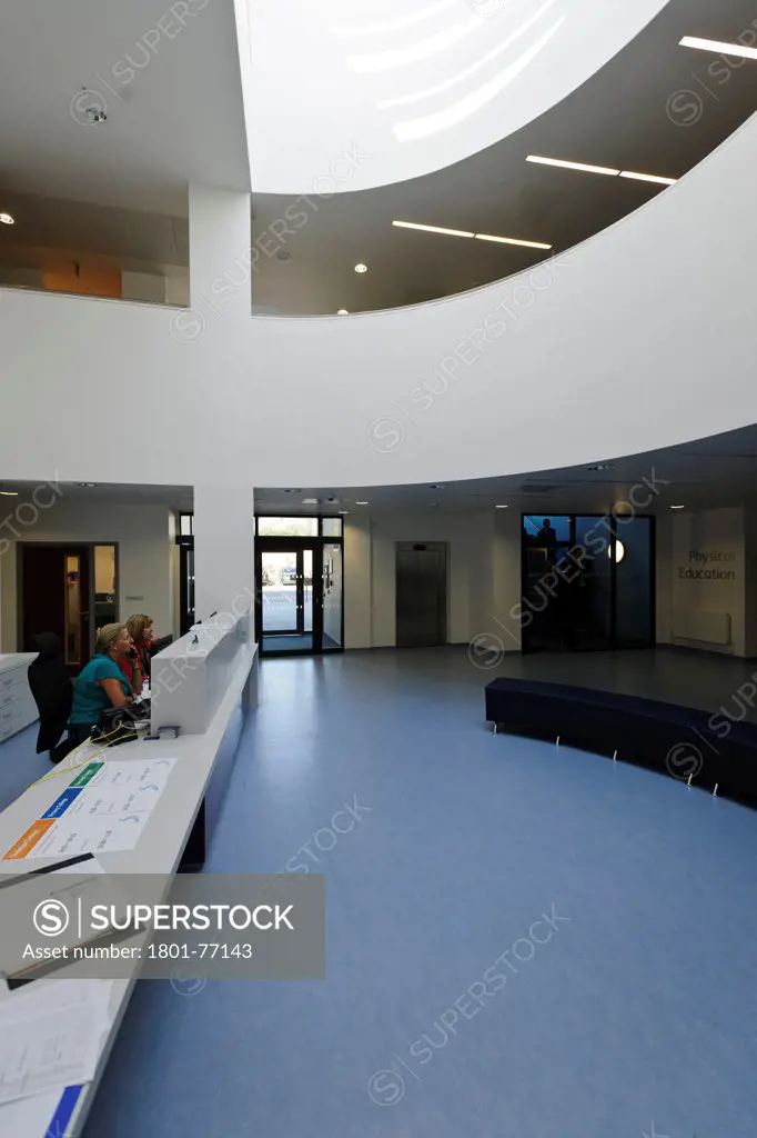 Strood Academy, Academy School, Europe, United Kingdom, Kent, 2012, Nicholas Hare Architects LLP. Reception desk and semi-circular circulation space.