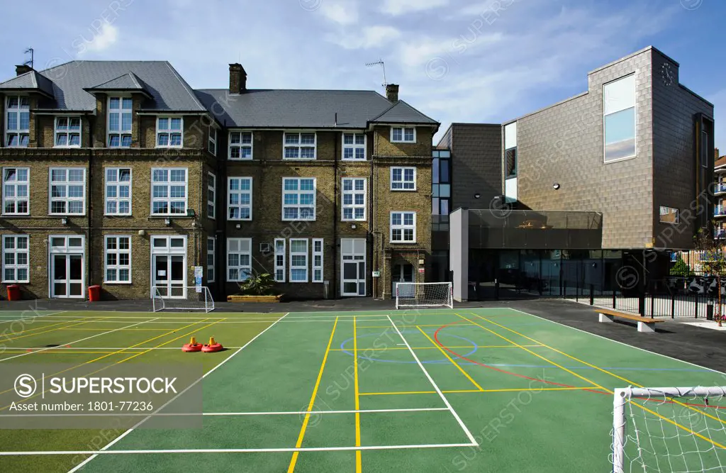 Orchard Primary School, Primary School, Europe, United Kingdom, , 2012, Rivington Street Studio. View of empty playground, reception entrance, new extension and existing buildings.