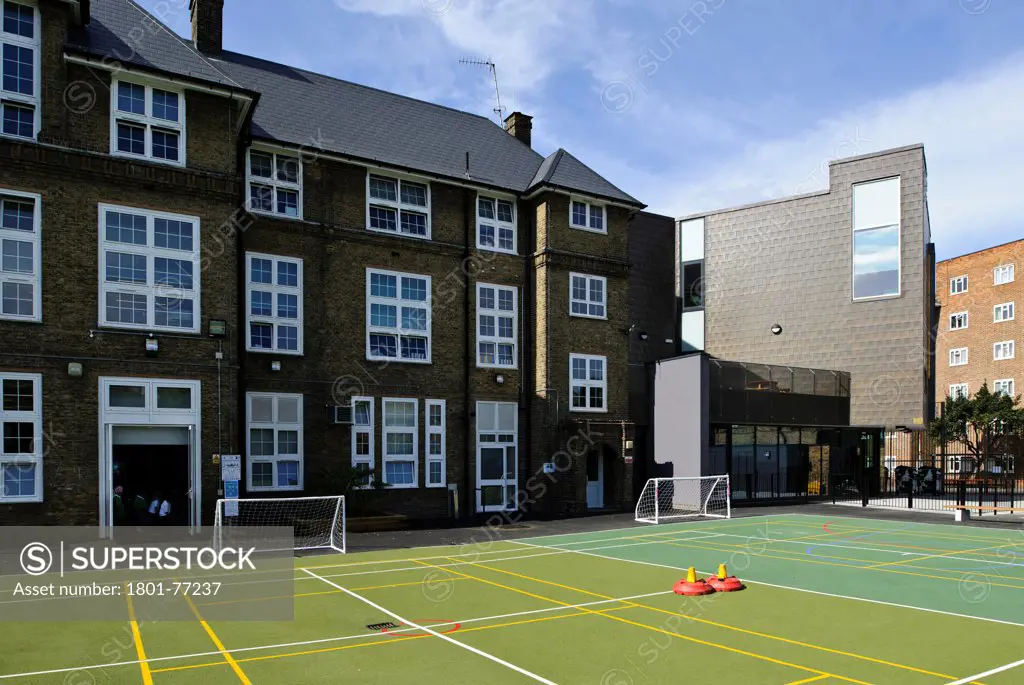 Orchard Primary School, Primary School, Europe, United Kingdom, , 2012, Rivington Street Studio. View of empty playground, reception entrance, new extension and existing buildings.