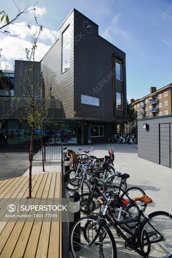 Orchard Primary School, Primary School, Europe, United Kingdom, , 2012, Rivington Street Studio. View of reception entrance, new extension and cycle racks.
